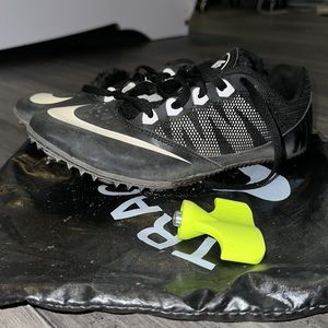 Nike Women’s ZoomRival S Track Racing shoe Black with spikes and spike screw